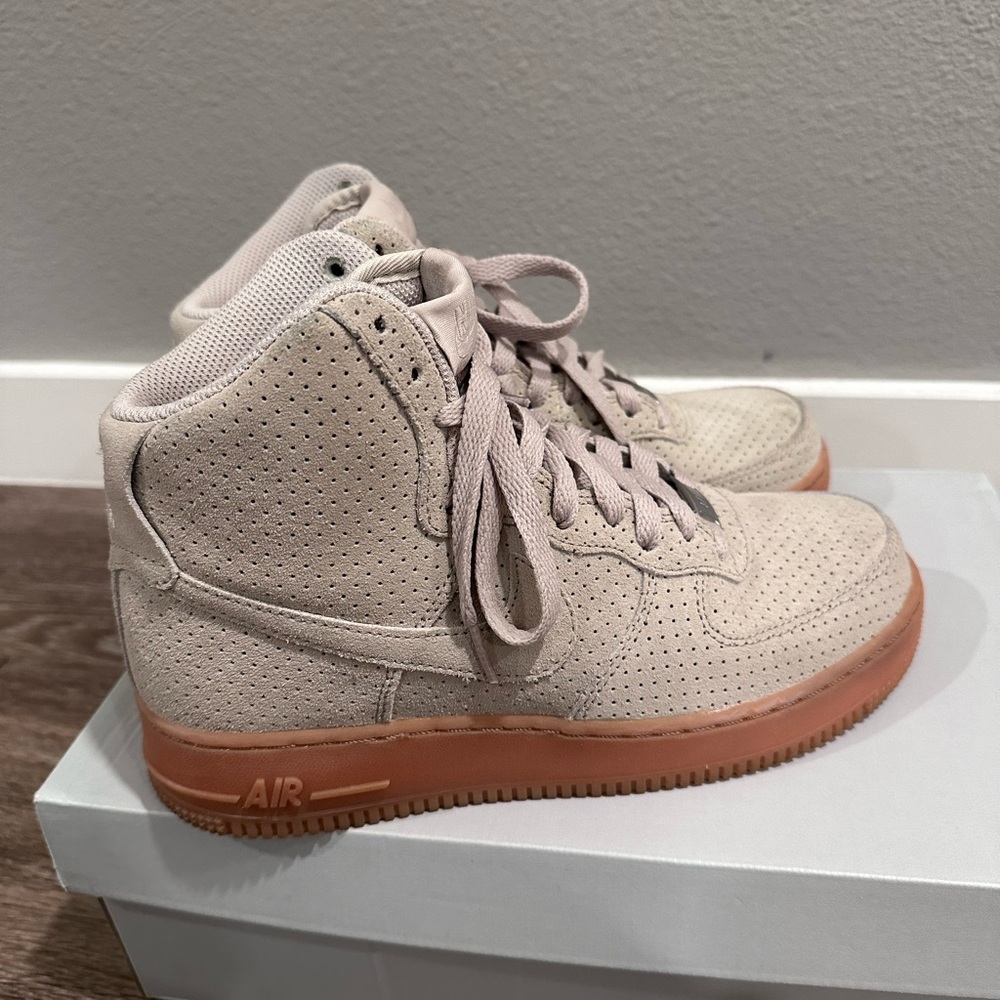 Nike Air Force 1 high top premium suede.
Women's size 8